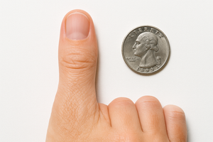 this is great, now one with the thumb flat (not flat in this photo) without the other fingers being flat next to the same coin