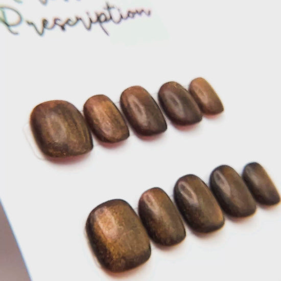 Chocolate Cat Eye: Shown in XS Round